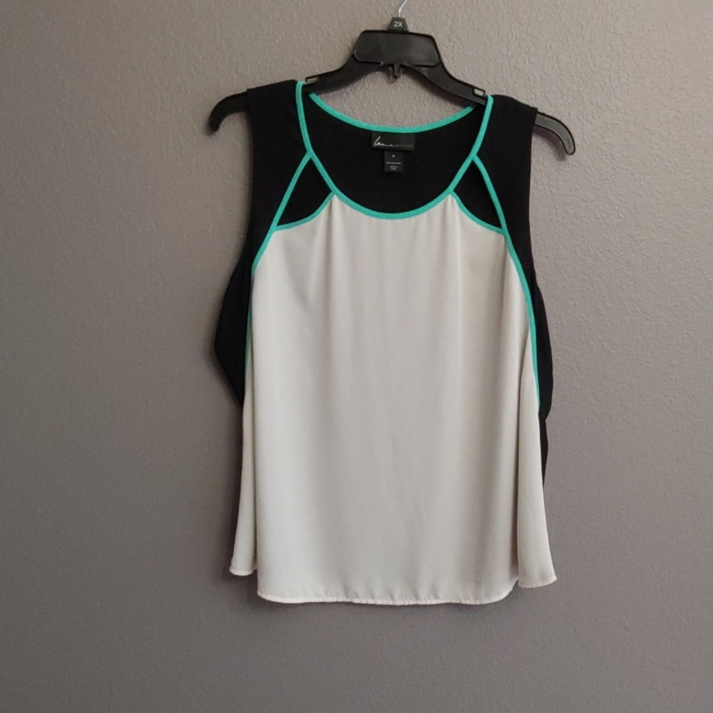 Black white blouse with teal trim cutouts